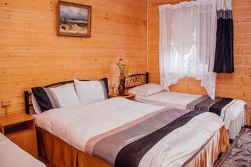 Фото номера Четырехместный номер Делюкс Гостиница Guest House U Vysotskoy г. Керчь 9