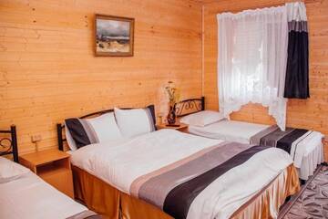 Фото номера Четырехместный номер Делюкс Гостиница Guest House U Vysotskoy г. Керчь 10